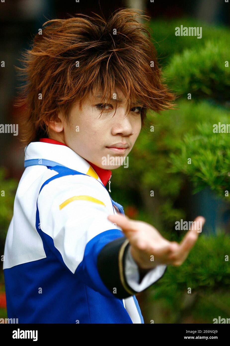 A cosplay enthusiast, dressed as the character Kira Yamato from the anime series Gundam Seed Destiny, takes part in the Cosfest VIII at a holiday resort in Singapore July 11, 2009. Cosplay, A cosplay enthusiast, dressed as the character Kira Yamato from the anime series Gundam Seed Destiny, takes part in the Cosfest VIII at a holiday resort in Singapore July 11, 2009. Cosplay,