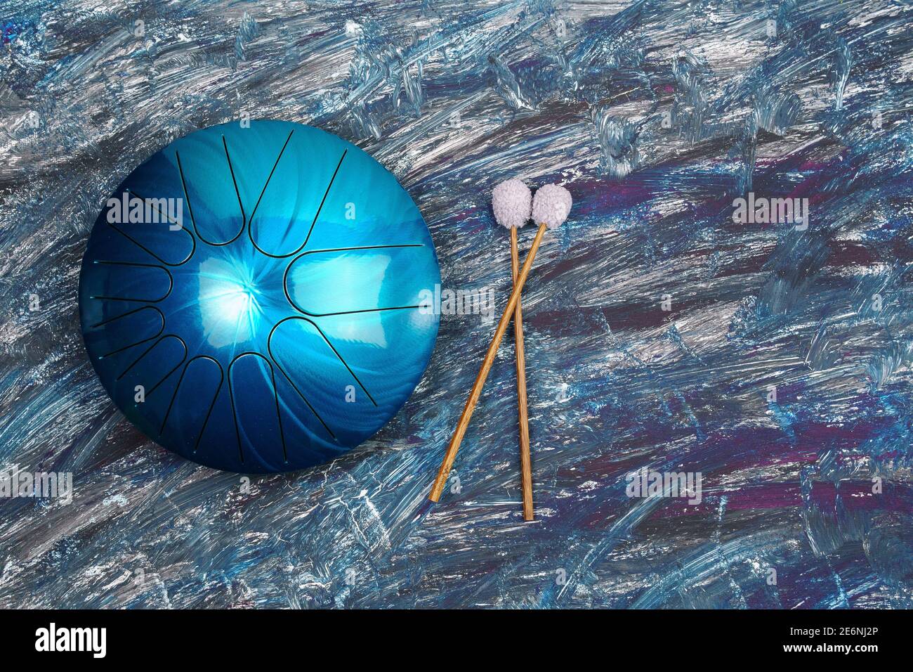 hang musical instrument, glucophone. metal tongue drum, modern musical