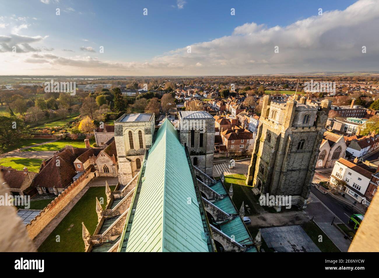 Looking west along the roof of the nave from the lantern of Chichester Cathedral showing the copper before renovation with traditional lead. Bell Towe Stock Photo