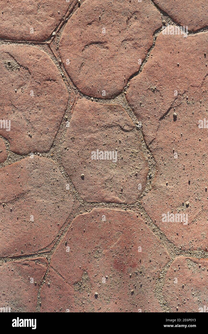 Tiled yellow brown aged dusty stone floor Stock Photo