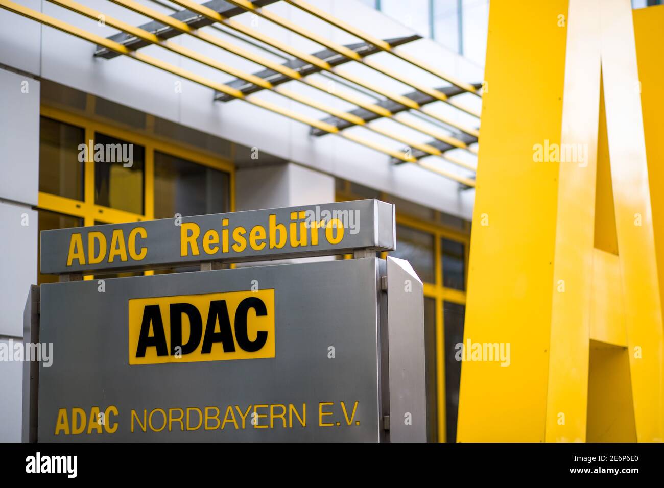 Nuremberg, Germany. 21st Jan, 2021. The logo of the automobile club ADAC stands on a pillar in front of the building at the headquarters of ADAC-Northern Bavaria. Credit: Daniel Karmann/dpa/Alamy Live News Stock Photo