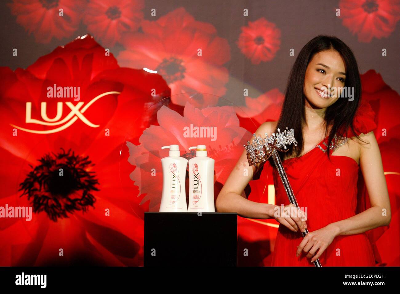 Hong Kong-based and Taiwan-born actress Shu Qi reacts to a question during a news conference in Taipei July, 7, 2008. Shu attended the news conference as the spokeswoman of Lux to promote Hong Kong-based and Taiwan-born actress Shu Qi reacts to a question during a news conference in Taipei July, 7, 2008. Shu attended the news conference as the spokeswoman of Lux to promote