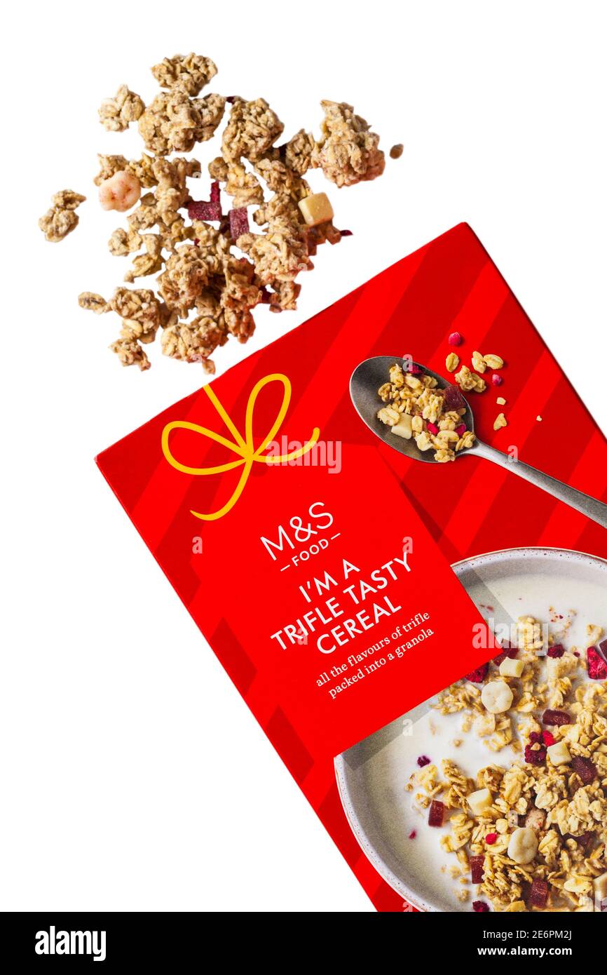 Box of M&S I'm a Trifle Tasty Cereal all the flavours of trifle packed into a granola opened with contents spilled spilt set on white background Stock Photo