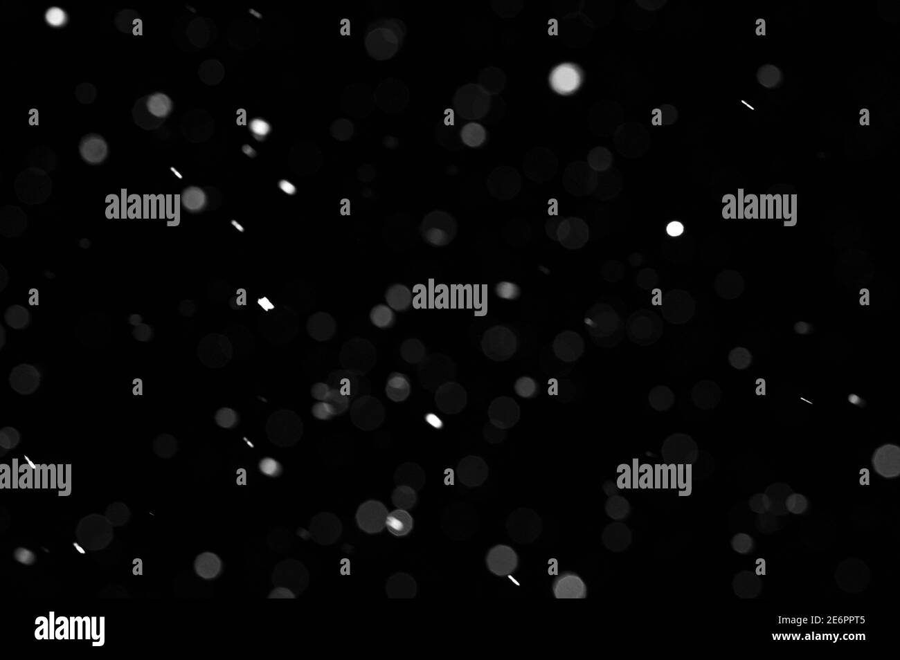 Bokeh of white snow on a black background. Snowfall - new design ...