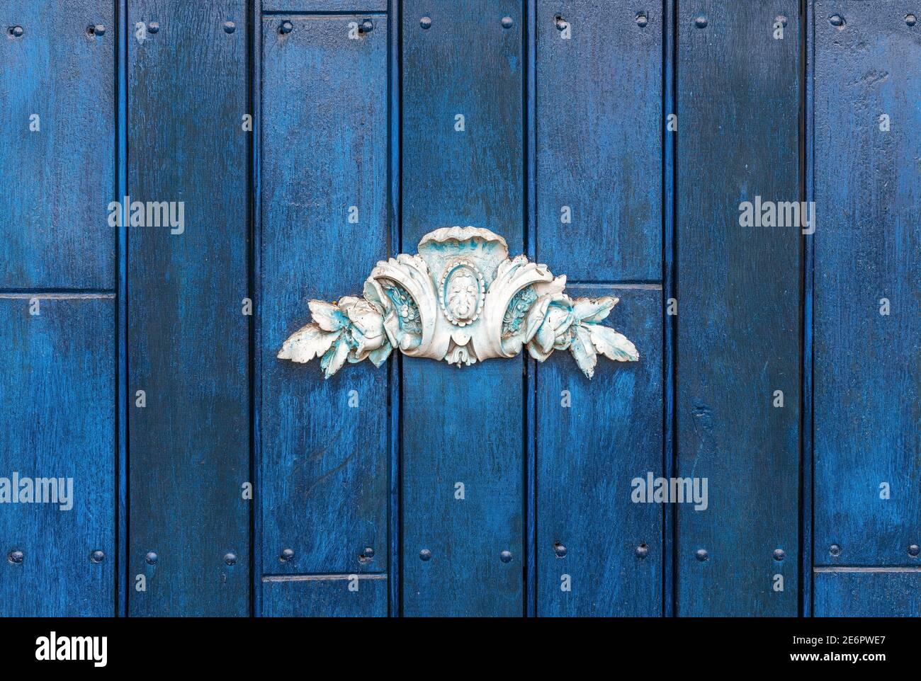 Ceramic decoration on blue door, Quito, Ecuador. Stock Photo