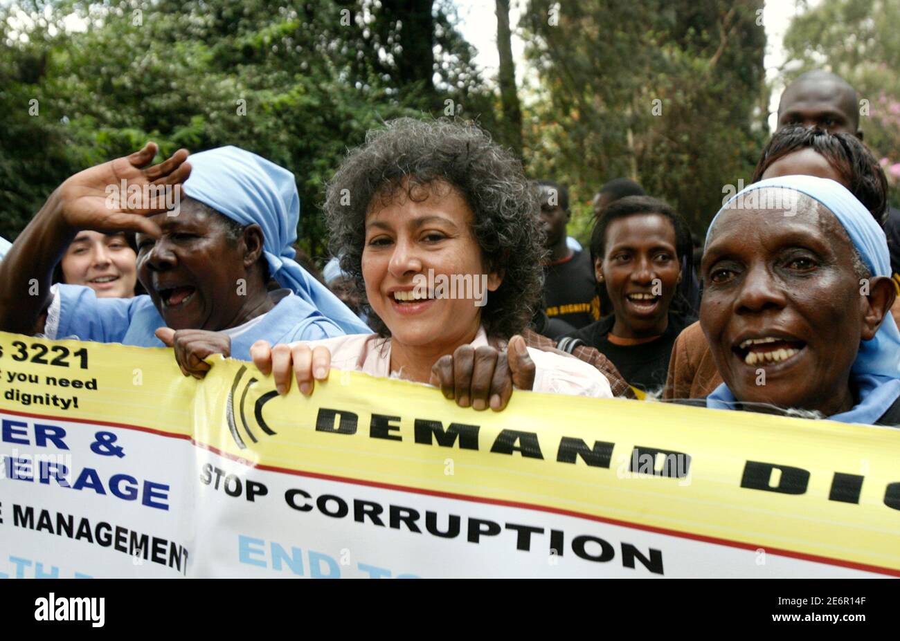 Amnesty International Secretary-General Irene Khan (C) participates in a demonstration with people from settlements in Nairobi to voice their demand for the right to adequate housing, June 11, 2009. REUTERS/Thomas Mukoya (KENYA SOCIETY CONFLICT POLITICS) Stock Photo