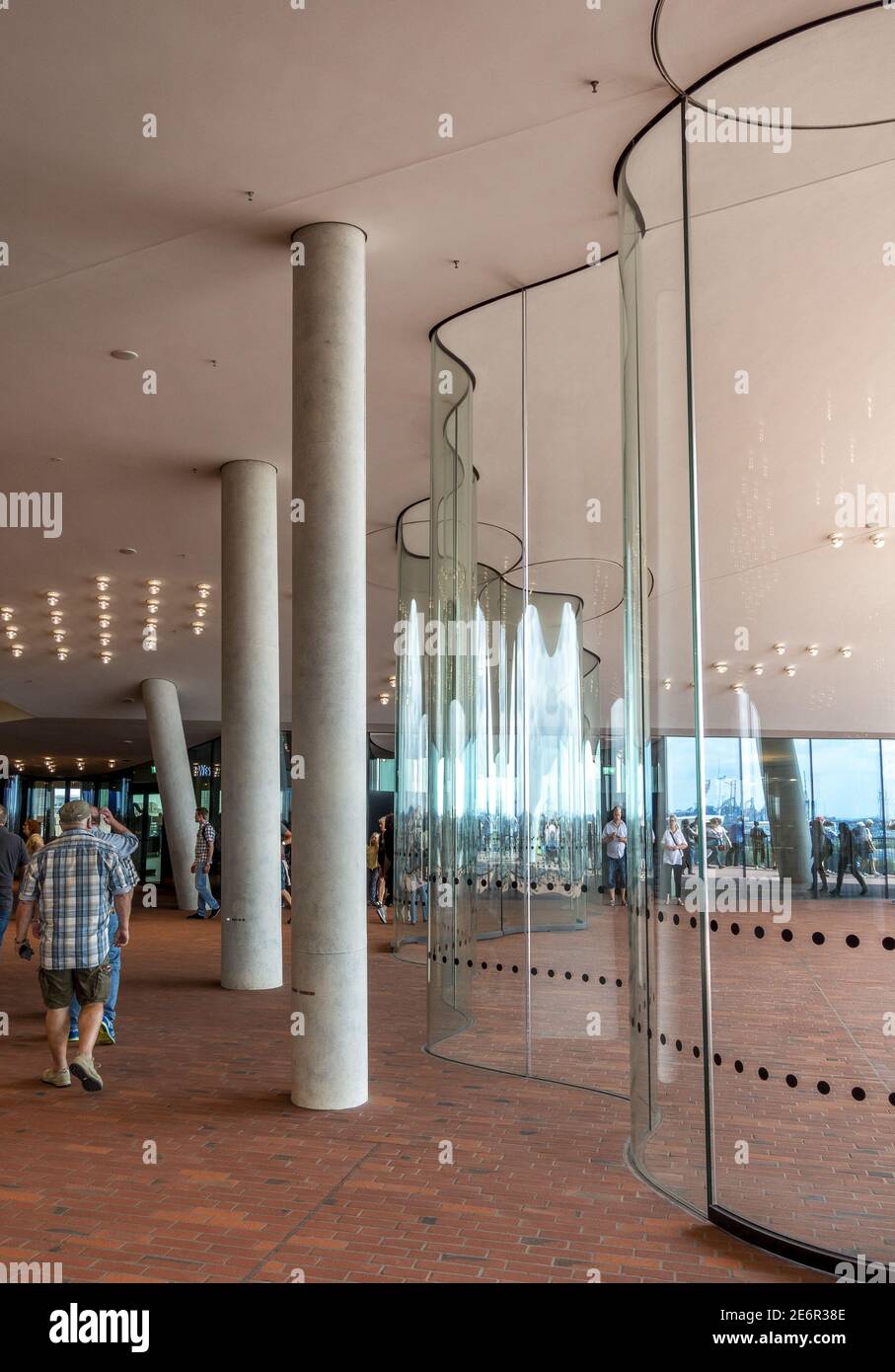 The impressive glass door entrance to the Elbphilharmonie a concert hall in Hamburg, Germany, on the Grasbrook peninsula of the Elbe River Stock Photo