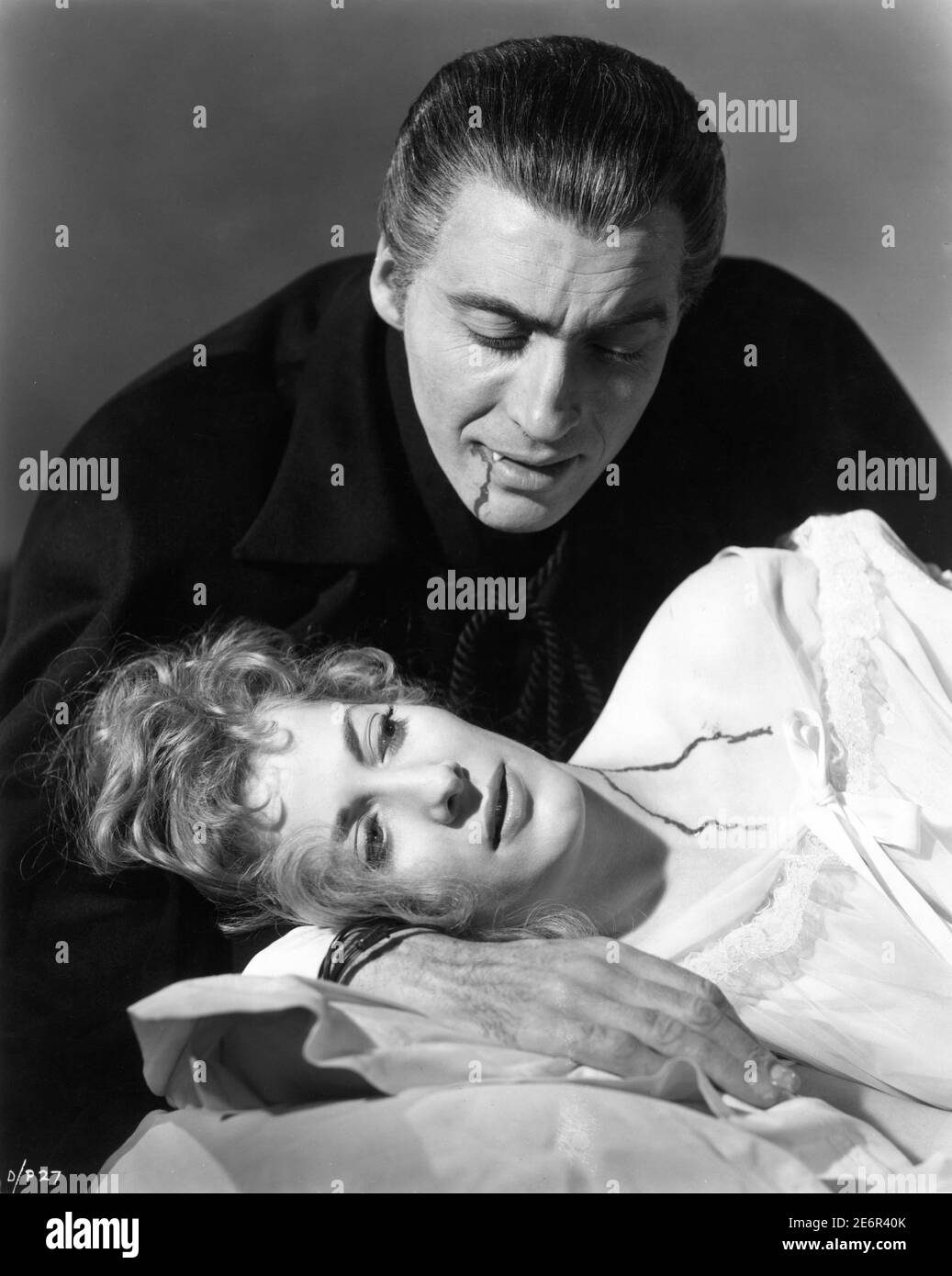 CHISTOPHER LEE as Count Dracula and MELISSA STRIBLING as Mina publicity portrait for DRACULA aka HORROR OF DRACULA 1958 director TERENCE FISHER novel Bram Stoker screenplay Jimmy Sangster Hammer Films / Rank Film Distributors (UK) / Universal Pictures (US) Stock Photo