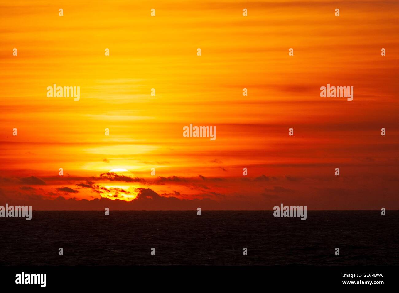 Sunset over the Atlantic ocean Stock Photo