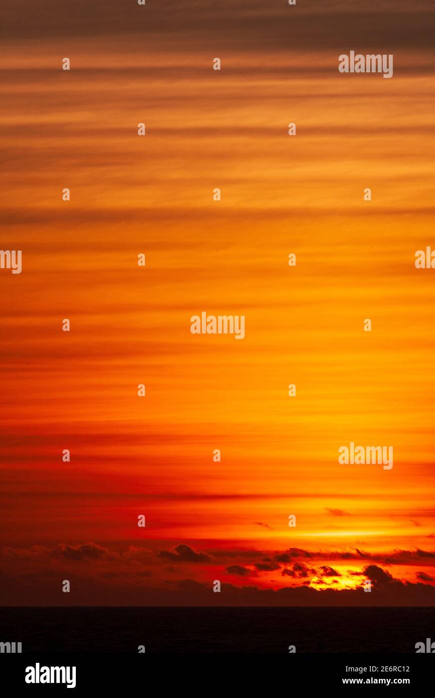 Sunset over the Atlantic ocean Stock Photo