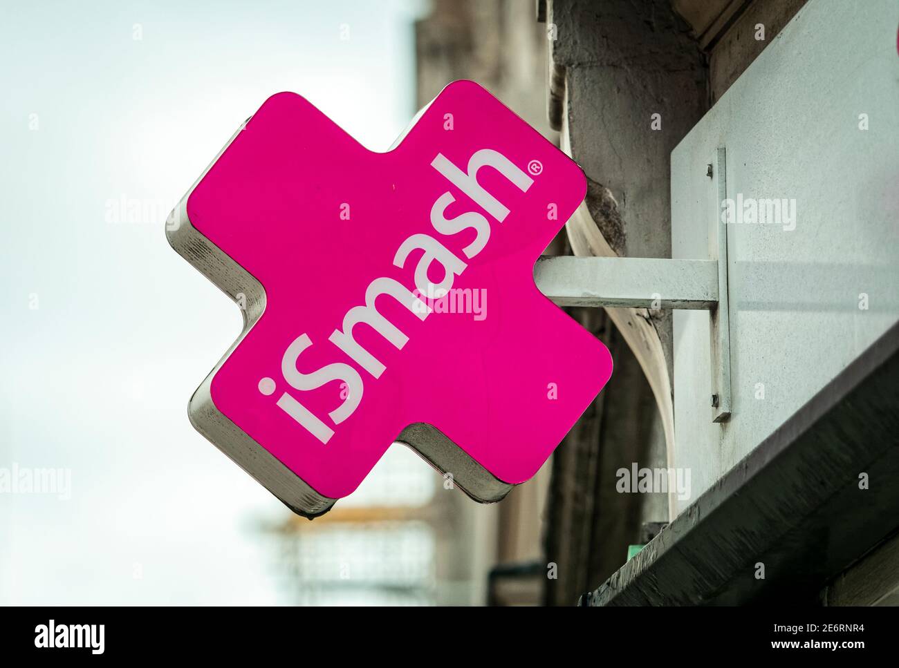 Ismash shop sign, Ismash are a high street repair service for Mobile Phones, Tablets and Computers founded in 2013, London, England - March 17, 2020 Stock Photo