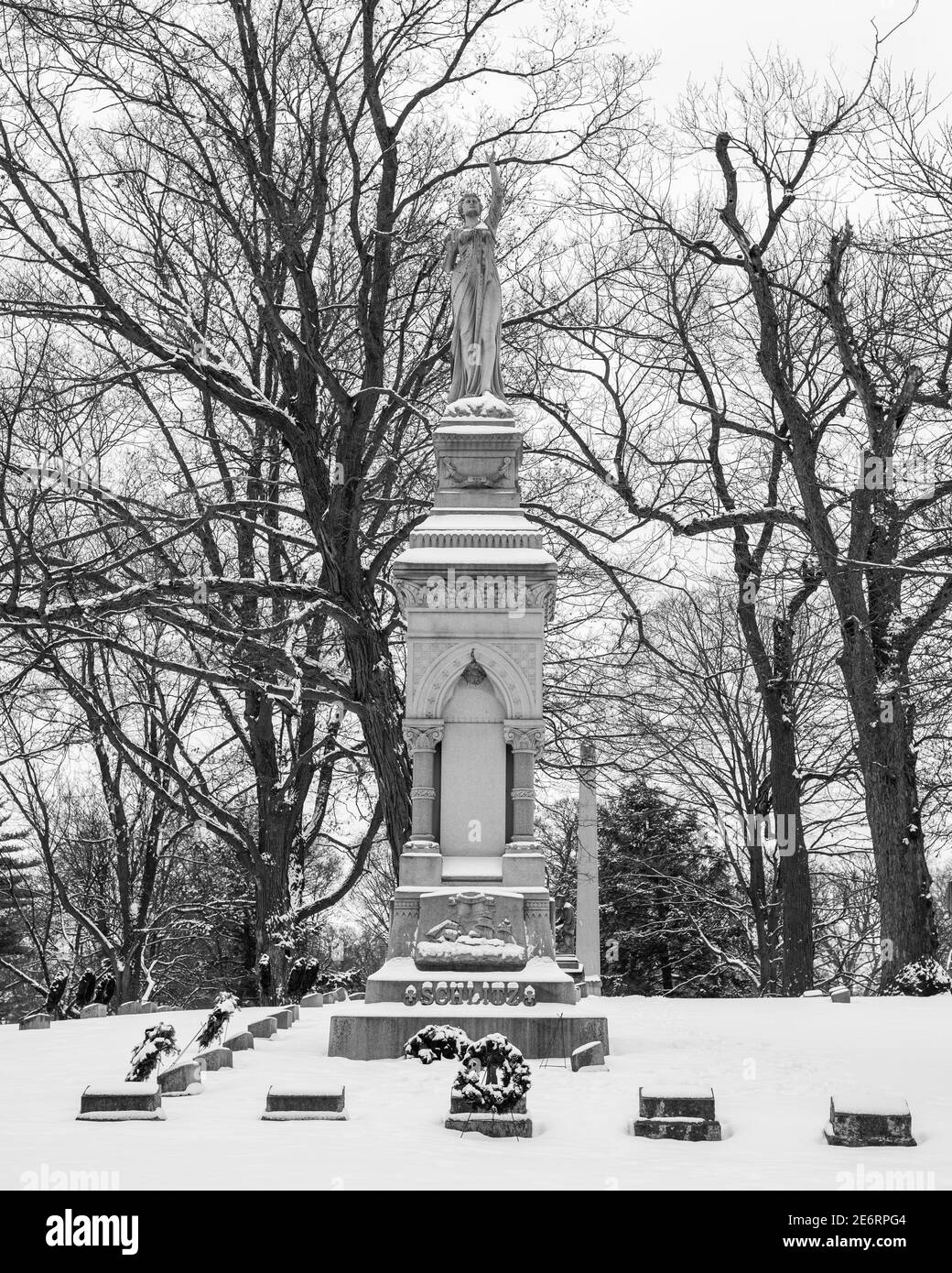 Schlitz grave at Forest Home cemetery in Milwaukee black and white snow