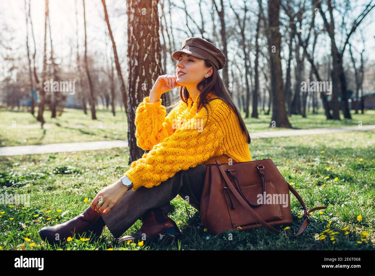 Woman in yellow sweater wearing hi-res stock photography and images - Alamy