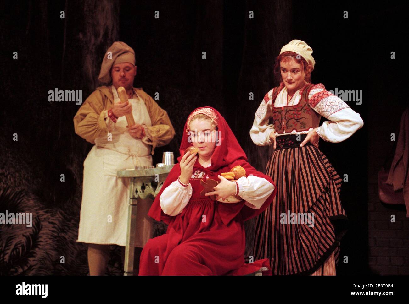 l-r: Nicholas Holder (The Baker), Sheridan Smith (Red Riding Hood), Sophie Thompson (The Baker's Wife) in INTO THE WOODS at the Donmar Warehouse, London WC2  16/11/1998  music & lyrics: Stephen Sondheim  book: James Lapine  design: Bob Crowley  lighting: Paul Pyant  director: John Crowley Stock Photo