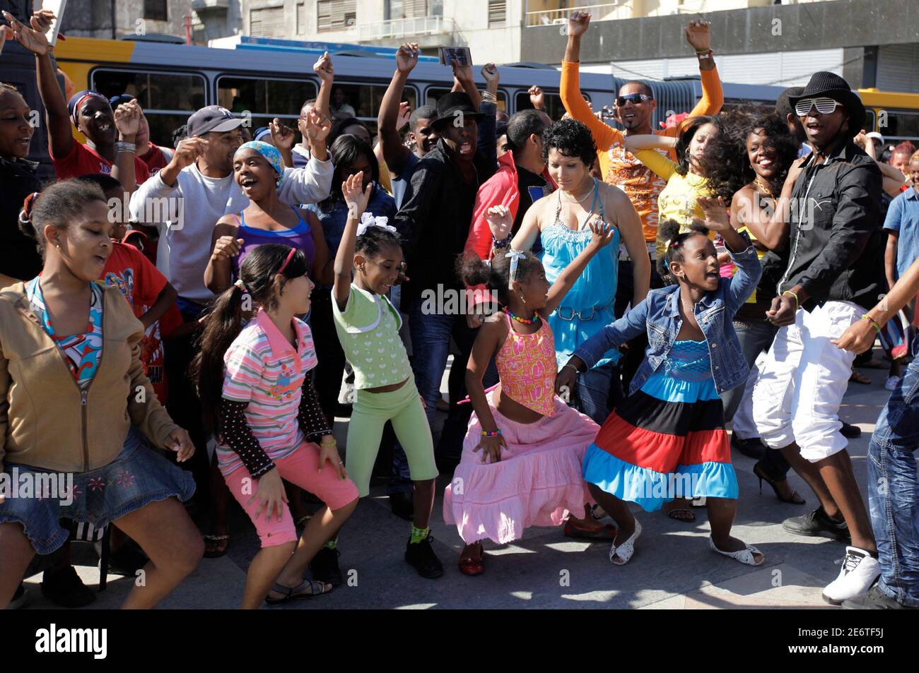 Members of Cuban salsa band "Bamboleo" dance in the street with people  during a video clip shoot in Havana February 8, 2010. REUTERS/Desmond  Boylan (CUBA - Tags: SOCIETY ENTERTAINMENT Stock Photo - Alamy