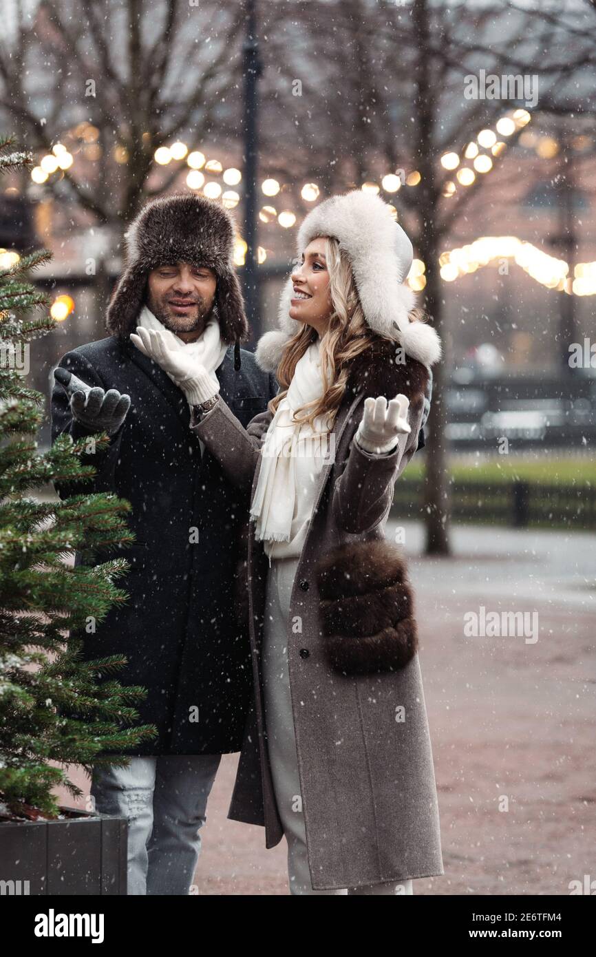 Happy fashion couple of lovers walking 