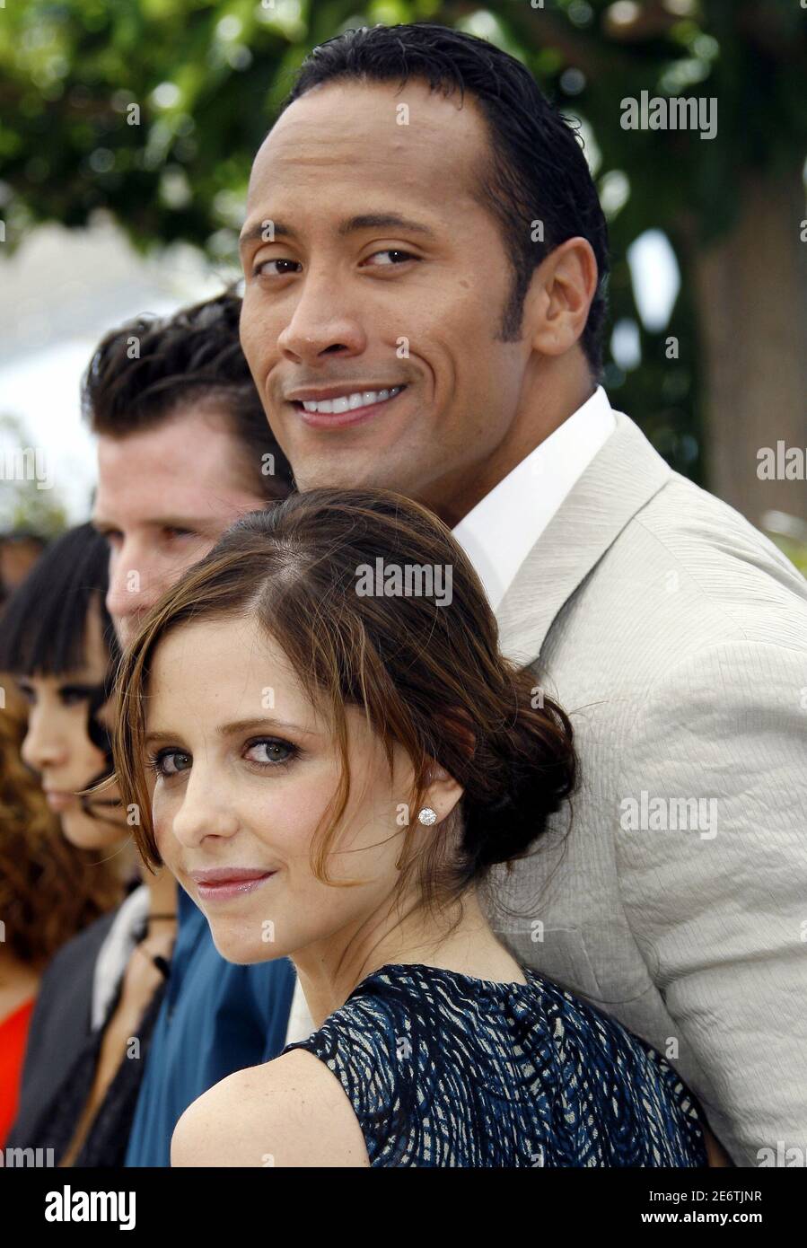 Cast members Dwayne 'The Rock' Johnson (R) and U.S. actress Sarah Michelle Gellar attend a photocall for [U.S. director Richard Kelly's] in-competition film 'Southland Tales' at the 59th Cannes Film Festival, May 21, 2006. Stock Photo