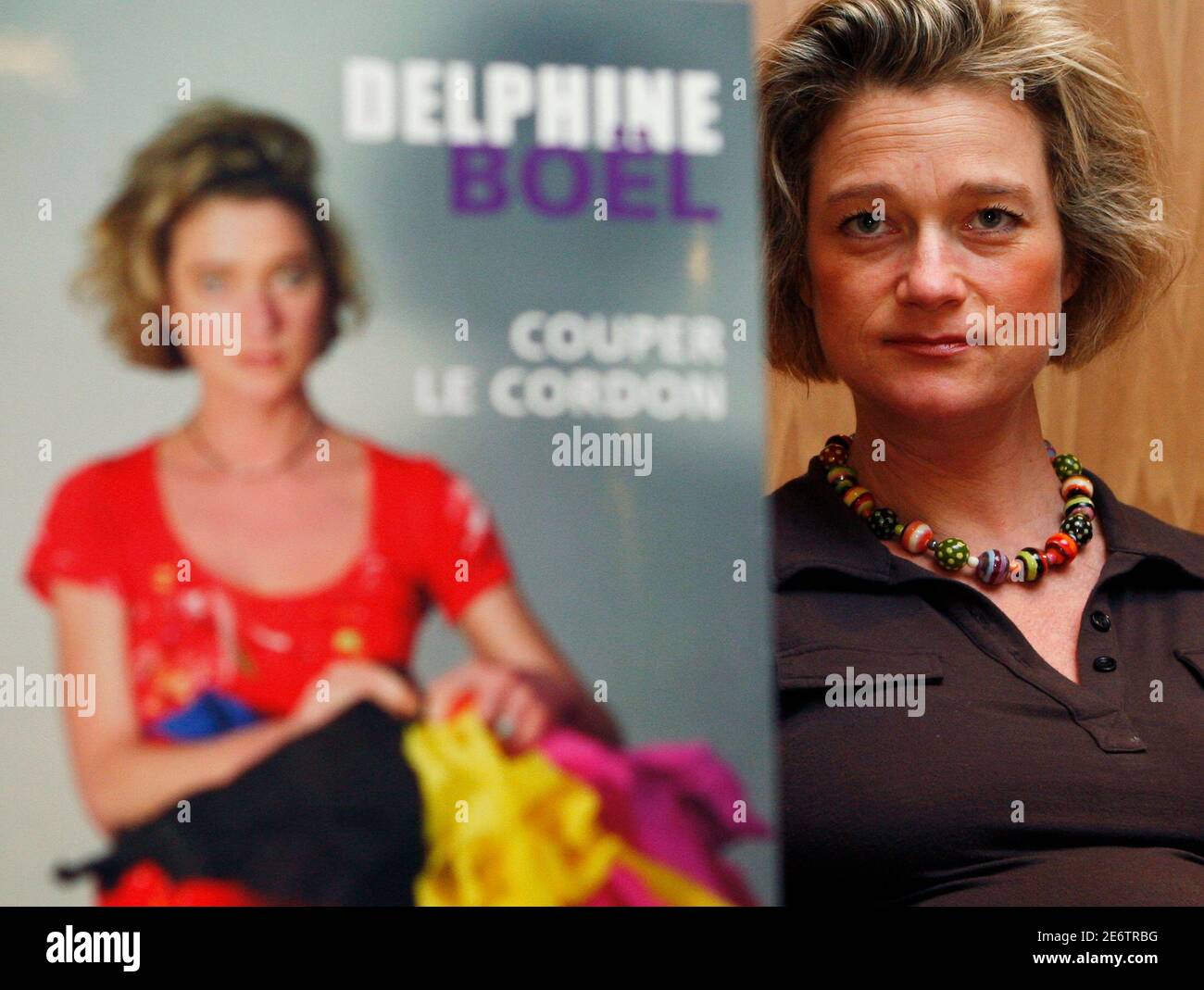 Belgian artist Delphine Boel, who says she is the illegitimate daughter of Belgian King Albert II, presents her book 'Cutting the Cord' in Brussels, in which she recounts her life and show examples of her art, April 9, 2008. The Royal Palace has never commented on whether the king is Boel's father.    REUTERS/Francois Lenoir       (BELGIUM) Stock Photo