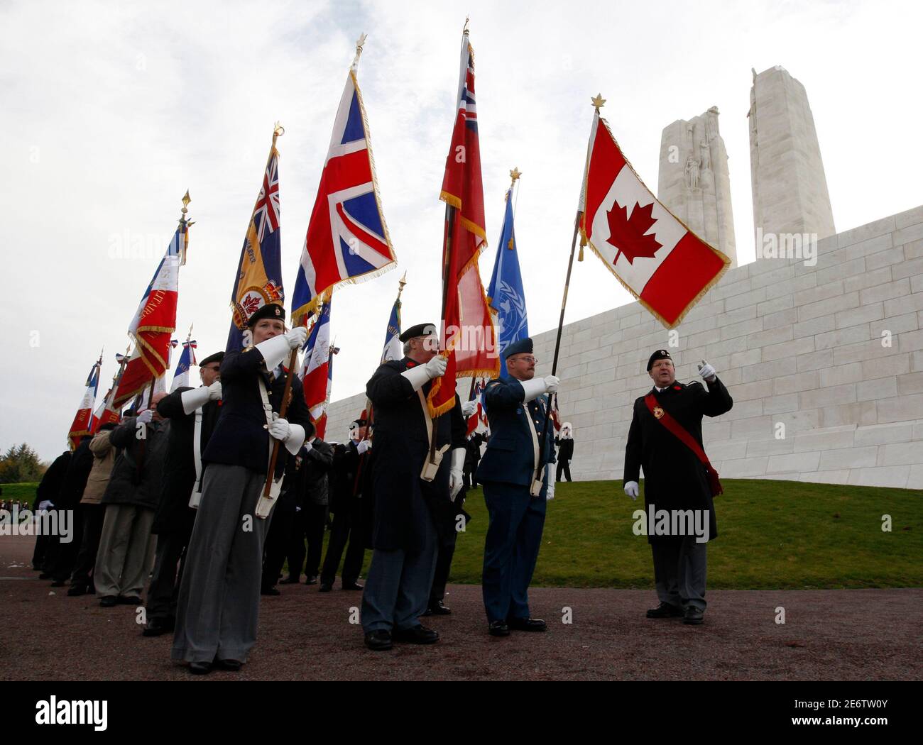 A colour party prepares to march away from the Canadian National Vimy Memorial following a Remembrance Day ceremony to commemorate members of the armed forces who were killed since World War One in Vimy November 9, 2008.       REUTERS/Chris Wattie       (FRANCE) Stock Photo