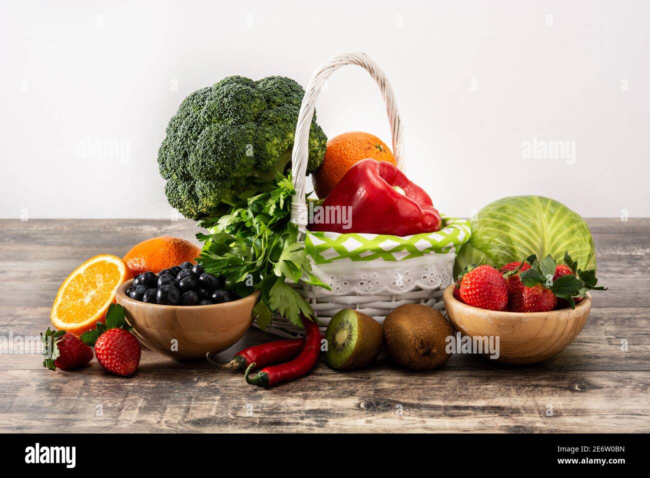 High in vitamin C food on wooden table Stock Photo