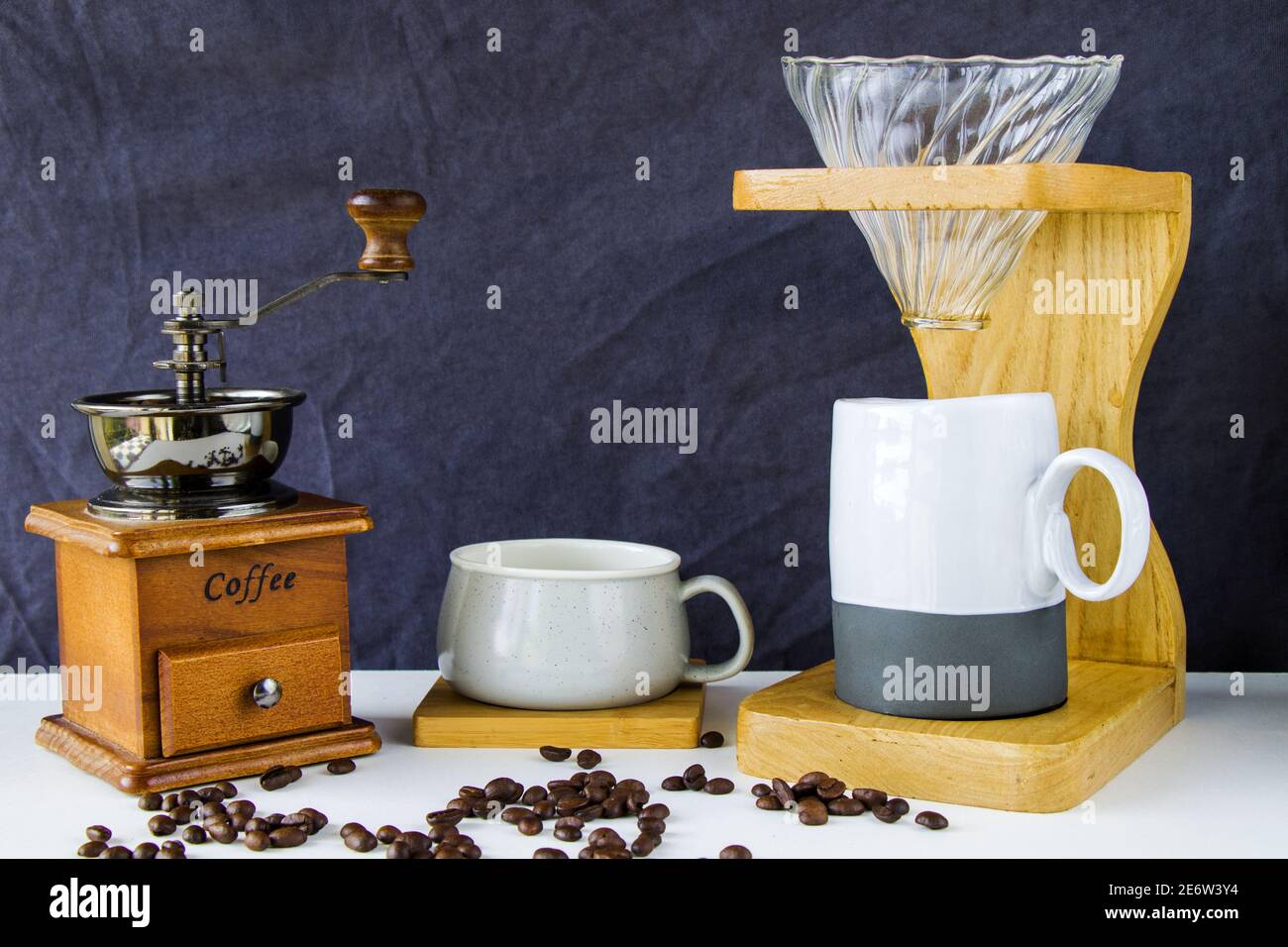 Coffee grinder, pouover coffee maker, cup and beans, morning coffee