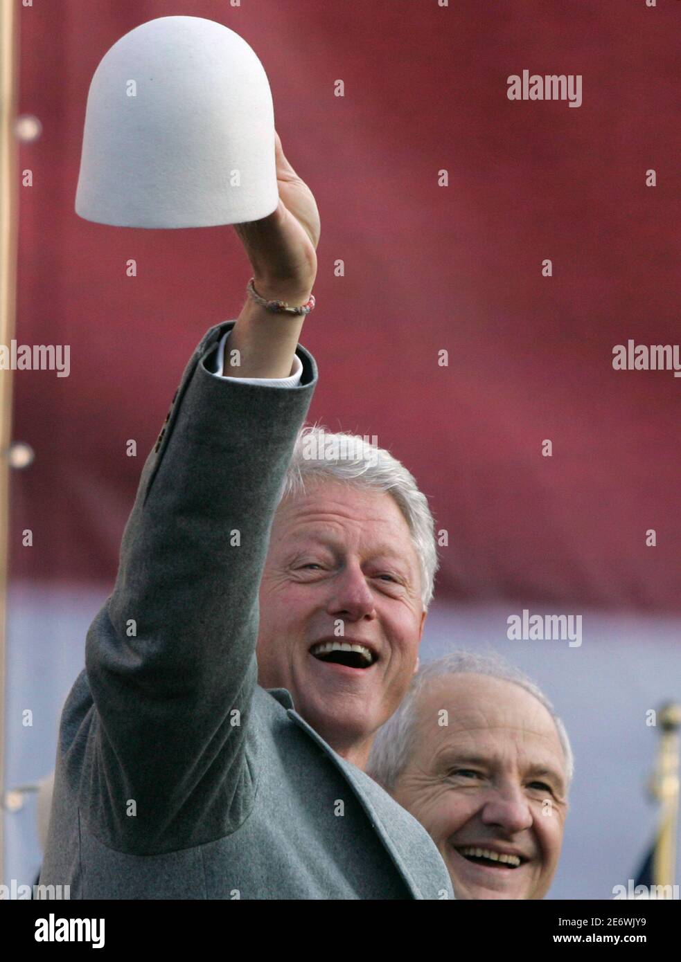 Former U.S. President Bill Clinton (L 