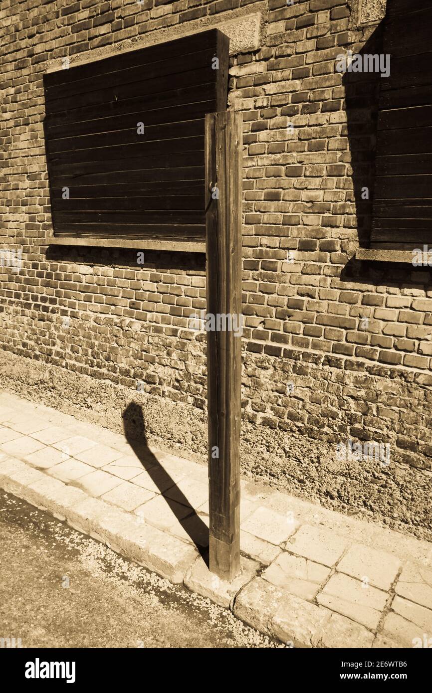 Whipping post at Auschwitz Stock Photo