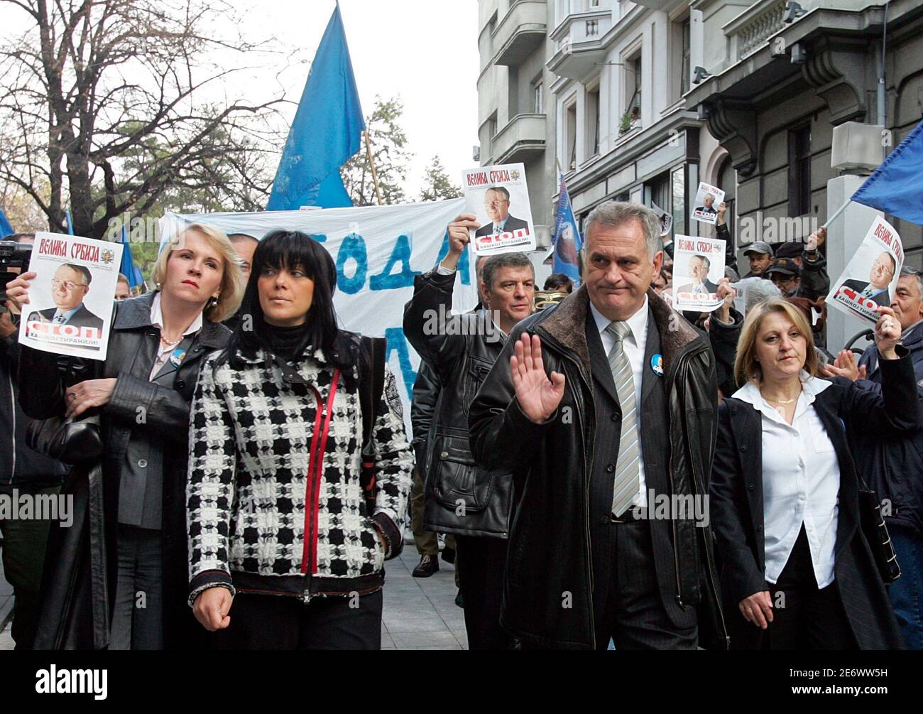 Serbian Radical Party deputy leader Tomislav Nikolic (2nd R), Jadranka  Seselj (2nd L), wife of Vojislav Seselj, and high party officials Natasa  Jovanovic (L) and Gordana Pop Lazic (R) arrive at a