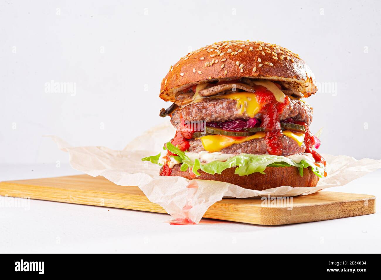 Fresh tasty burger isolated on white background Stock Photo