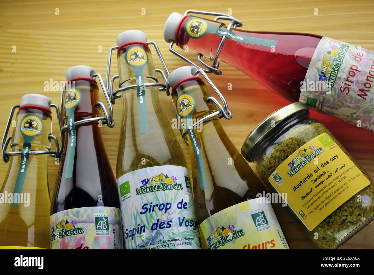 France, Vosges, Gerardmer, Le Beillard, la Ferme du Bien Etre, farmers, producers and processors of aromatic, medicinal and perfume plants, AB label, bottles of syrup, jar of mustard Bear garlic Stock Photo