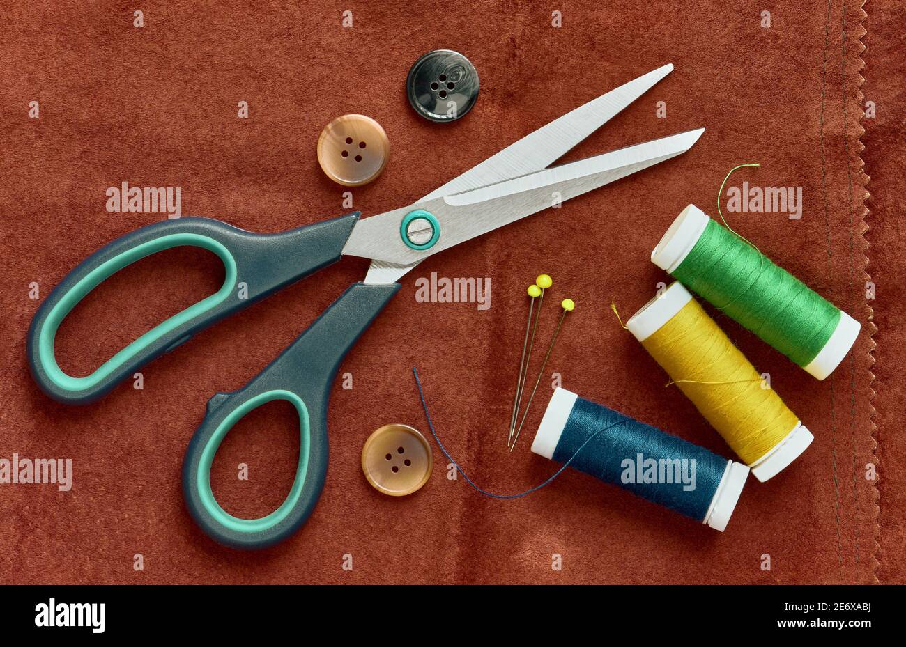 Sewing items and seamstress tools. Tailoring measuring tape, rulers, pins,  buttons, fabric Stock Photo - Alamy