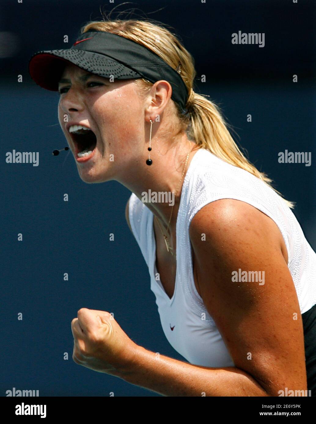 Russian Maria Sharapova yells out after holding her server against Switzerland's Patty Schnyder during the singles final at the Acura Classic tennis tournament in Carlsbad, California August 5, 2007. Sharapova won.      REUTERS/Mike Blake             (UNITED STATES) Stock Photo