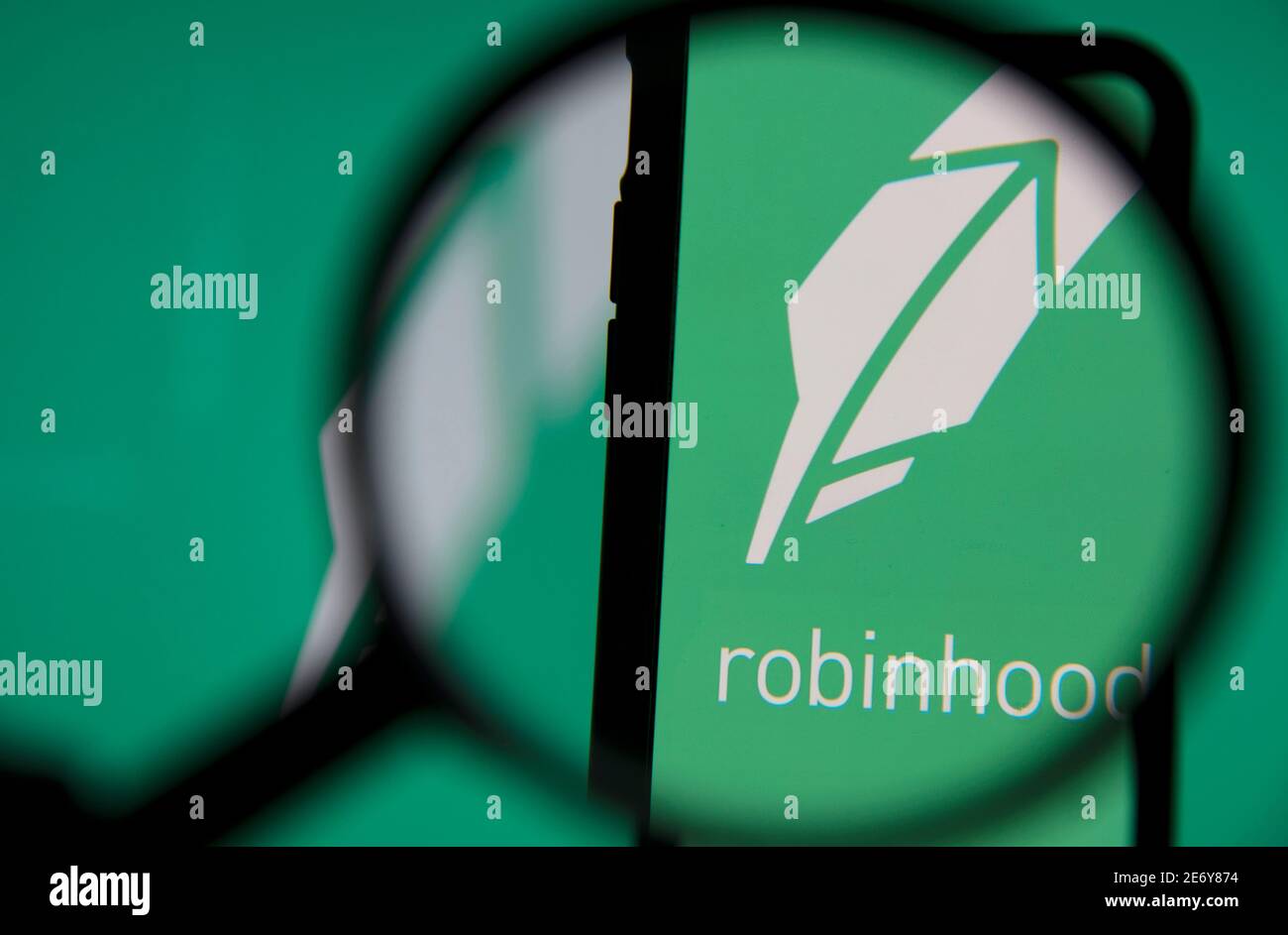 LONDON, UK - January 2021: Robinhood investing app under magnifying glass Stock Photo