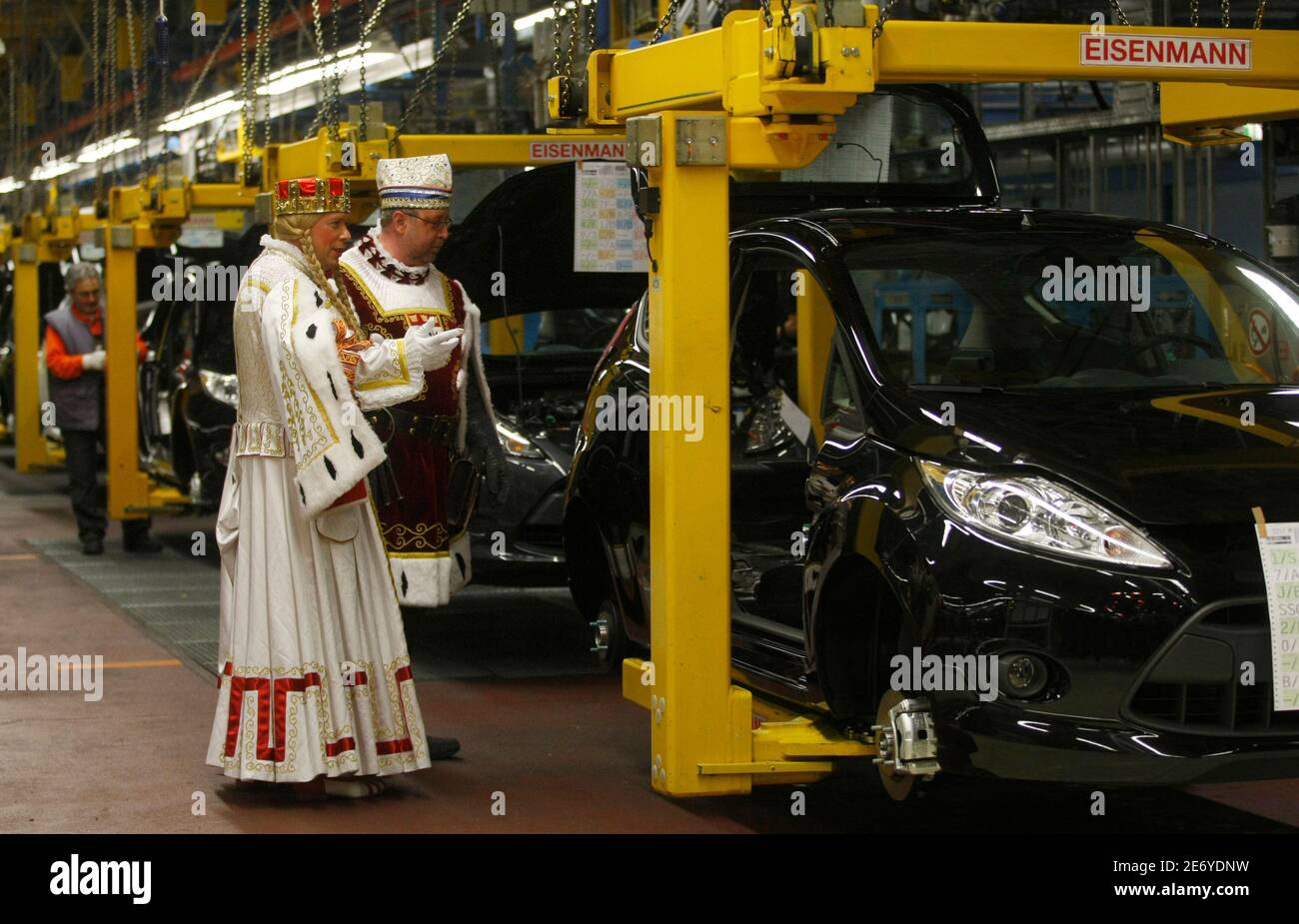 The Cologne carnival triumvirate 'Dreigestirn' visits the Cologne plant of the Ford Motor Company January 27, 2010. The Cologne plant is the first Ford assembly facility in the world to build the new generation Ford Fiesta.   REUTERS/Ina Fassbender   (GERMANY - Tags: TRANSPORT EMPLOYMENT BUSINESS IMAGES OF THE DAY) Stock Photo