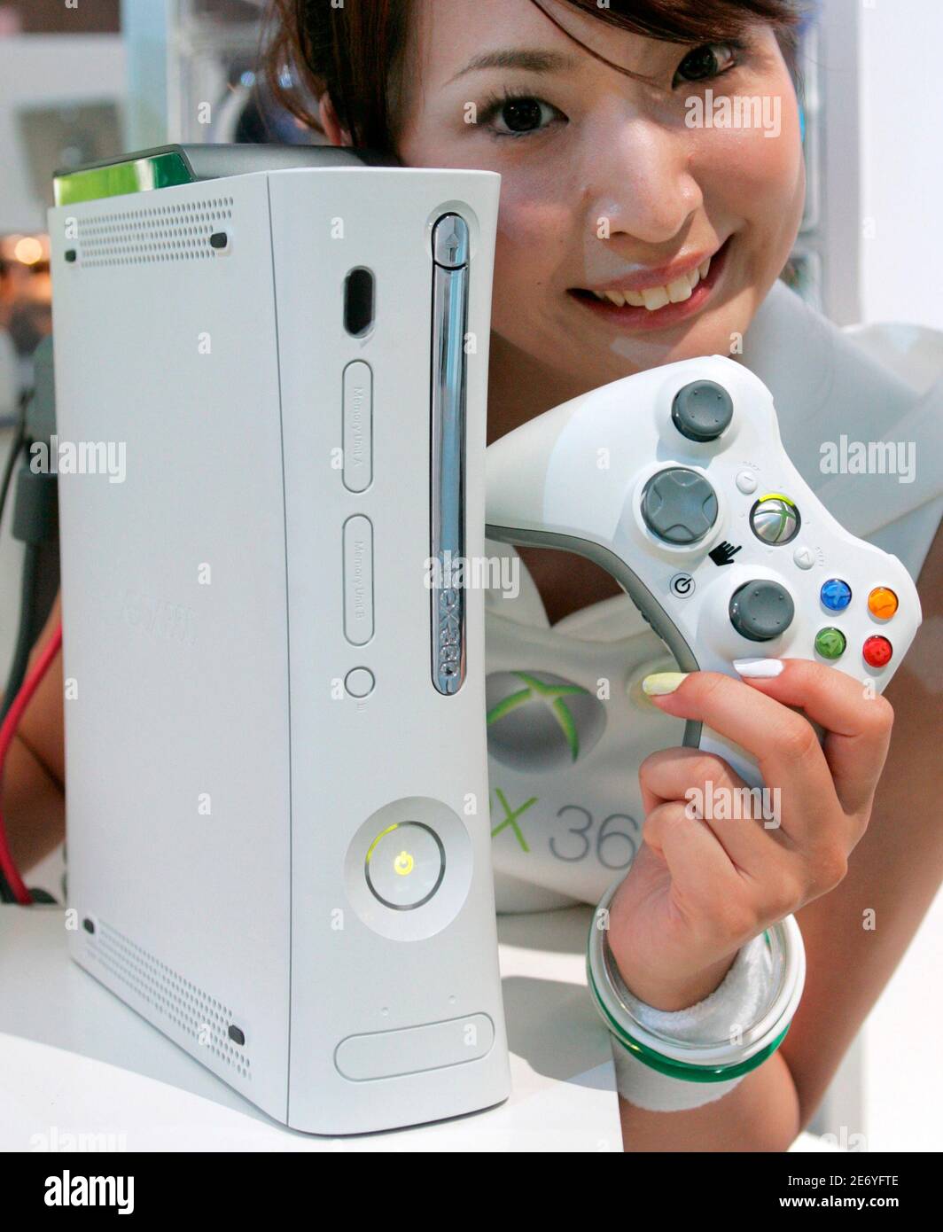A model displays Microsoft Corp's next-generation Xbox 360 video game  console at Tokyo Game Show 2005, Japan's biggest video game software  exhibition, at Makuhari Messe Convention Centre in Chiba, east of Tokyo