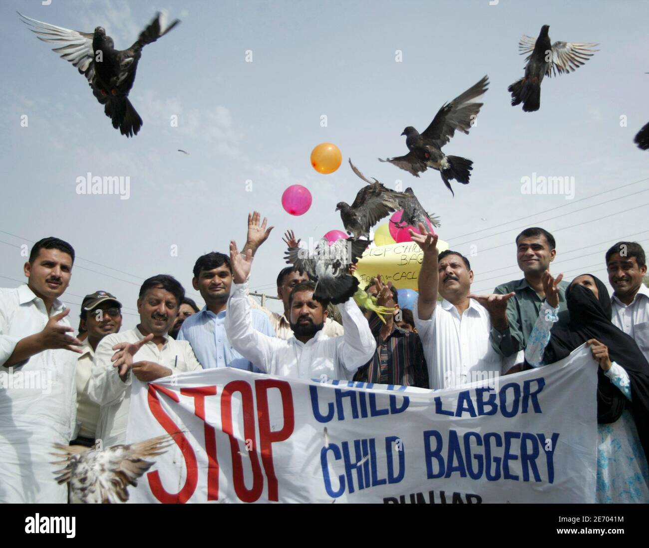Members Of Collation For Anti Child Labour Cacl Release Pigeons To Mark World Day Against Child Labour In Multan June 12 07 Reuters Asim Tanveer Pakistan Stock Photo Alamy