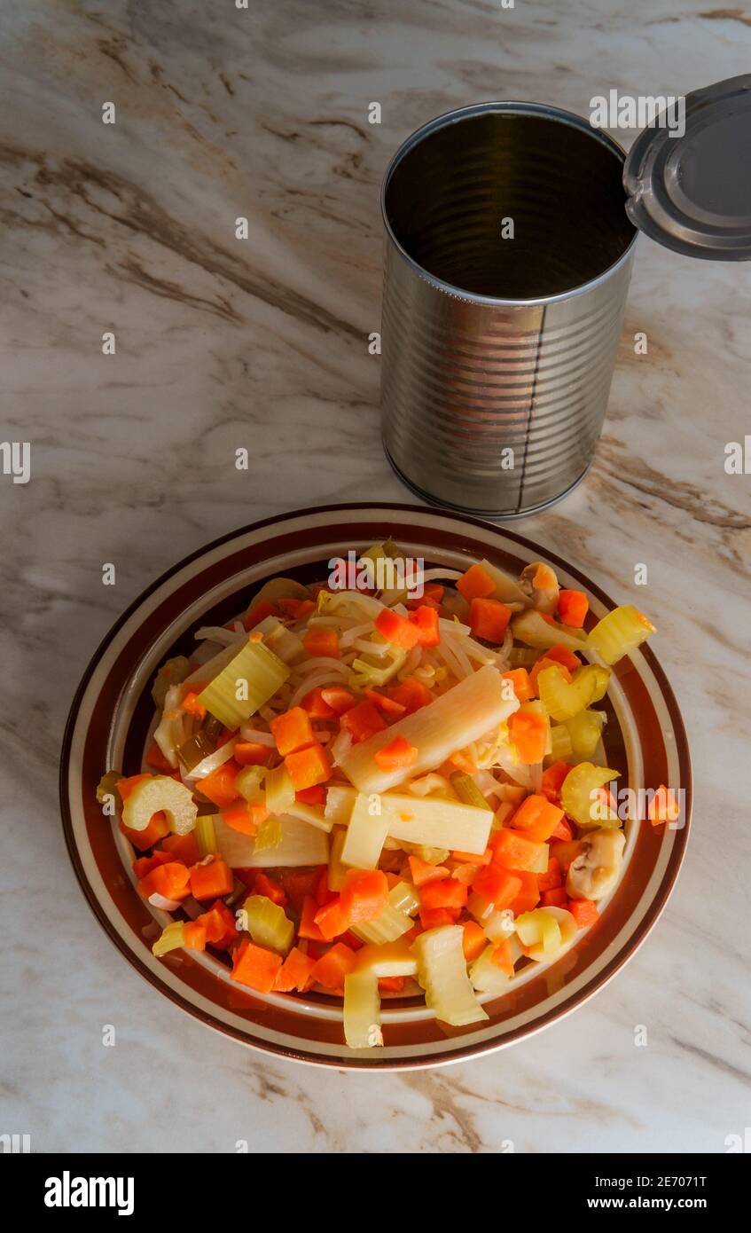 Canned Chinese food chop suey on marble kitchen table Stock Photo Alamy