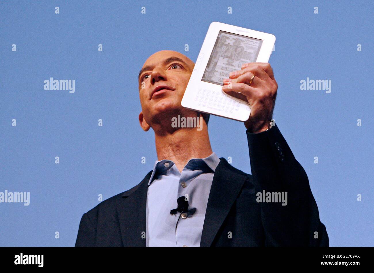 Amazon Com Founder And Ceo Jeff Bezos Holds The New Kindle 2 Electronic Reader At A News Conference In New York Where The Device Was Introduced February 9 2009 The Kindle 2 The Amazon Com Founder And Ceo Jeff Bezos Holds The New Kindle 2 Electronic Reader At A News Conference In New York Where The Device Was Introduced February 9 2009 The Kindle 2 The