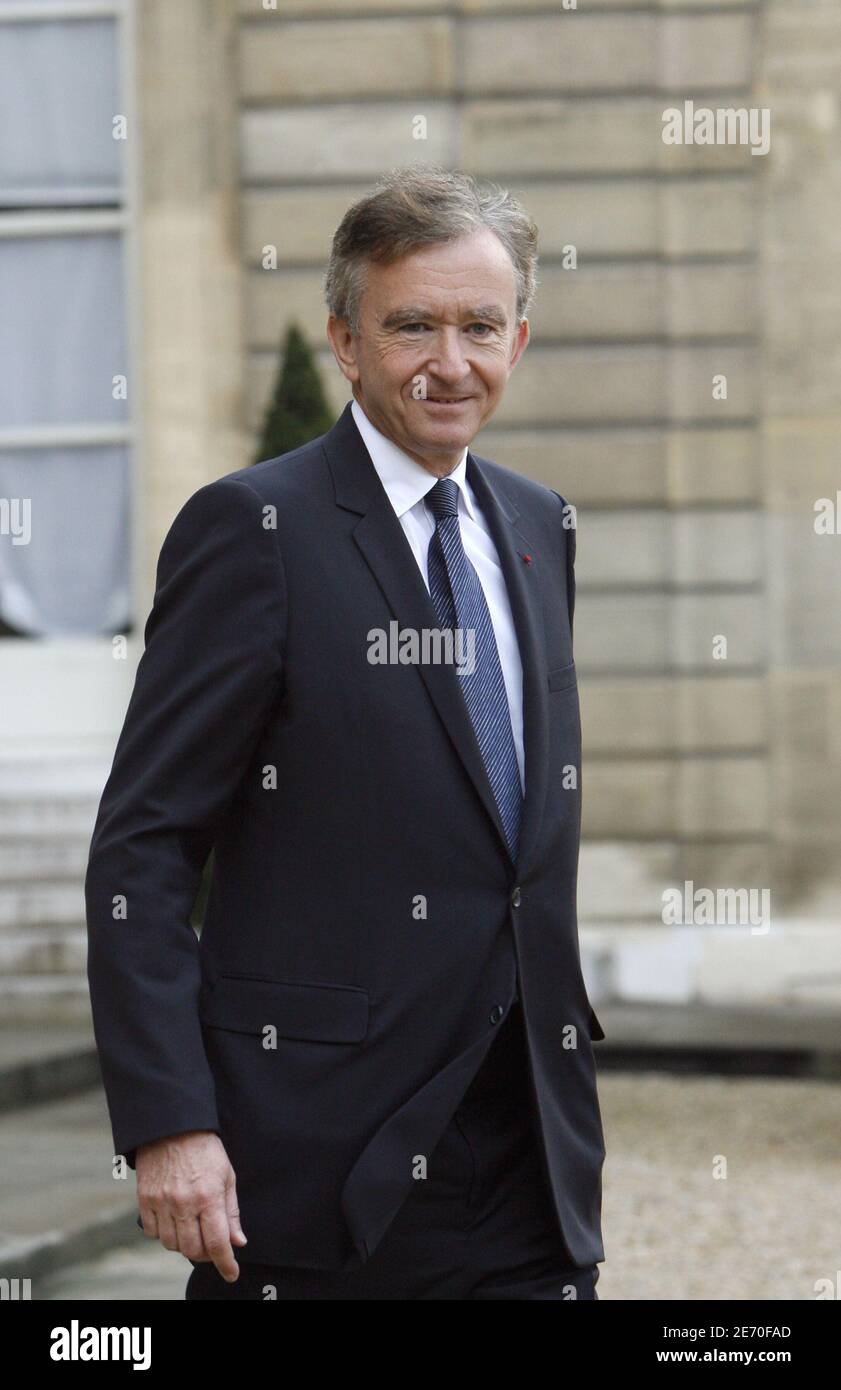 Bernard Arnault leaves the Vuitton show at le carreau du temple