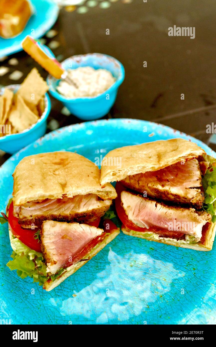 Seared tuna sandwiches from the Eaton Street Fish Market.  Key West, Florida, FL USA.  Southern most point in the continental USA.  Island vacation Stock Photo