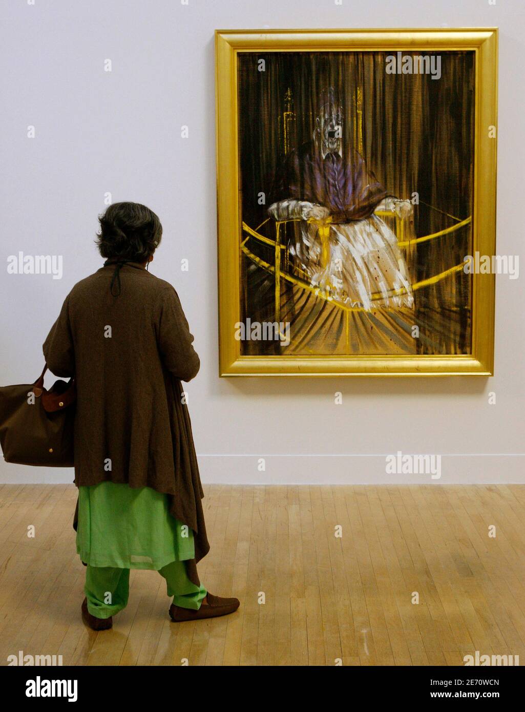 A woman looks at Francis Bacon's "Study after Velazquez's Portrait of Pope  Innocent X" 1953 during a press preview for Tate Britain's exhibition of  the work of Francis Bacon (1909-1992) in London