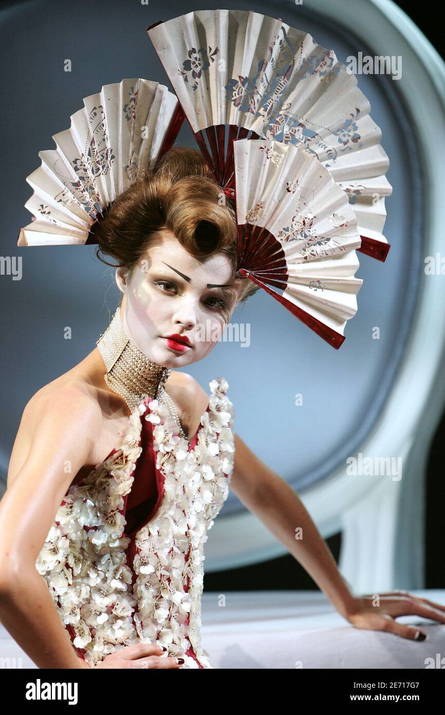 A model presents a creation by British designer John Galliano for