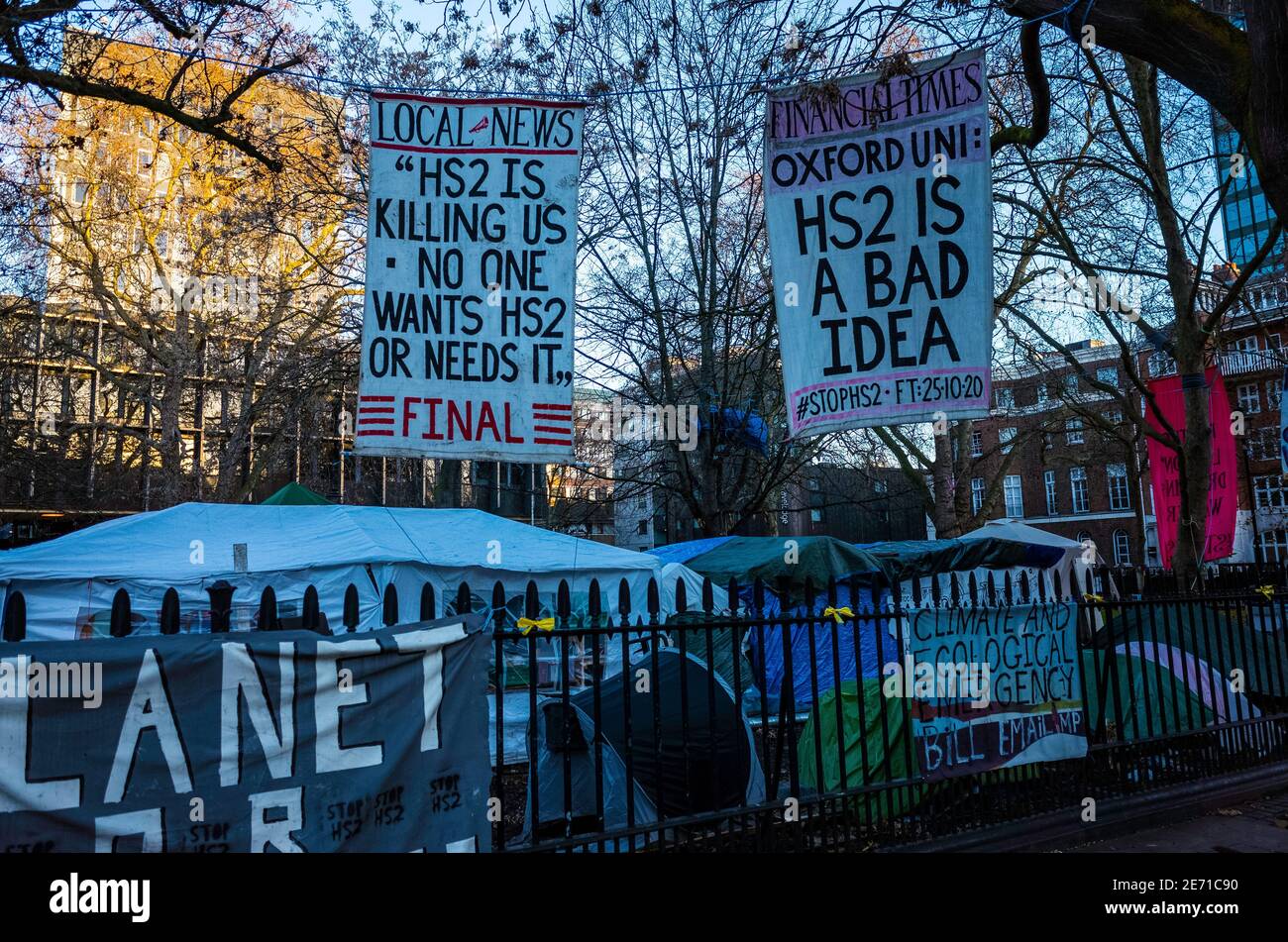 Anti HS2 campaigners campsite and banners at Euston train station London. Stock Photo