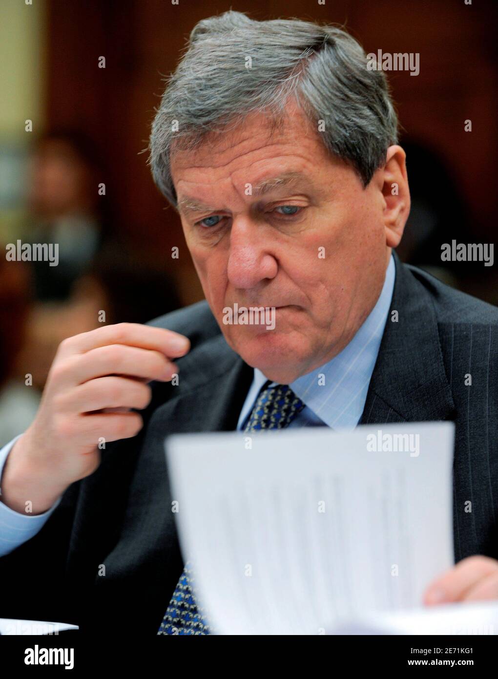 U.S. Special Representative for Afghanistan and Pakistan Richard Holbrooke looks at his notes as he prepares to testify before a House Foreign Affairs Committee hearing on 'The Future of the US-Pakistan Relationship', on Capitol Hill in Washington, May 5, 2009. The panel questioned Holbrooke on recent territorial gains by the Taliban in western Pakistan.         REUTERS/Mike Theiler   (UNITED STATES POLITICS CONFLICT IMAGES OF THE DAY) Stock Photo