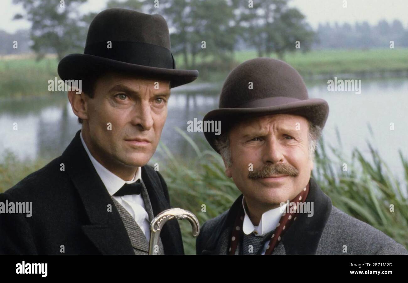 THE ADVENTURES OF SHERLOCK HOLMES 1984-94 Granada TV series with Jeremy Brett at right as Holmes and Edward Hardwicke as Dr. Watson Stock Photo