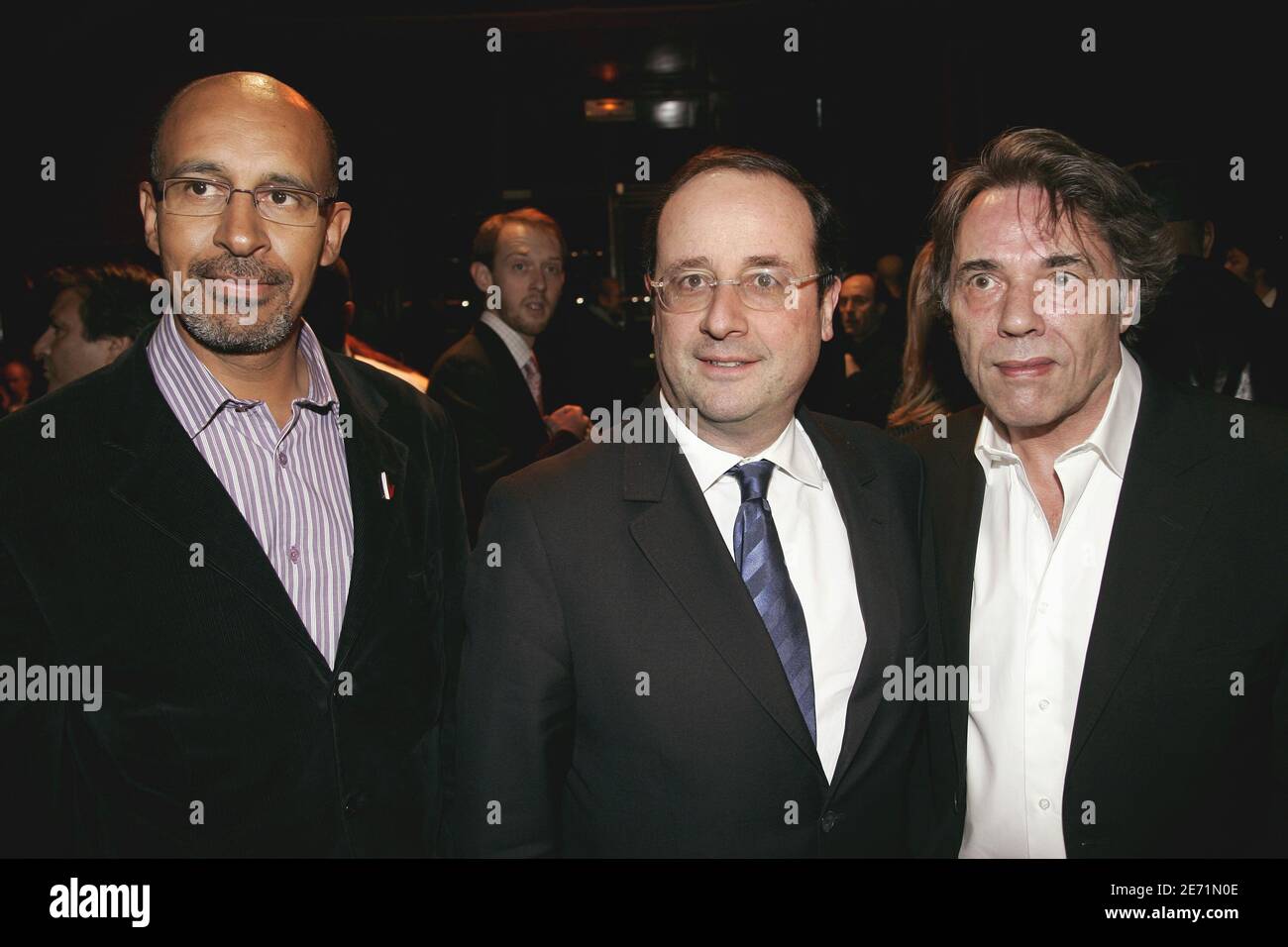 Harlem Desir, Francois Hollande and Yves Simon attend the annual dinner for godmothers and godfathers of French anti-racism association 'SOS Racisme' held at the Cabaret Sauvage in Paris, France on january 29, 2007. Photo by Mousse/ABACAPRESS.COM Stock Photo