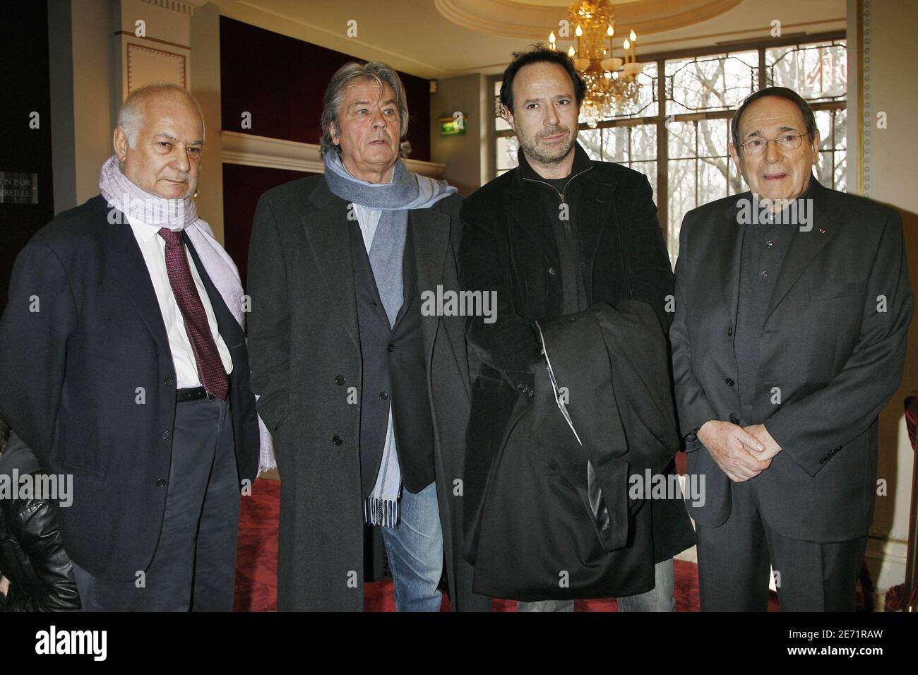 Jean-Claude Brialy, Alain Delon, Marc Levy and Robert Hossein at the  unveilling of a photography of Ingrid Betancourt on the front of 'Le  theatre Marigny' by Paris Mayor Bertrand Delanoe, in Paris,