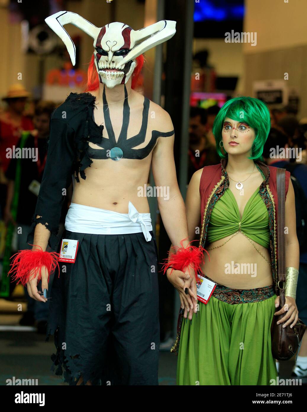 Attendees arrive in costume for the third day of the pop culture convention Comic Con in San Diego, California July 24, 2010.    REUTERS/Mike Blake  (UNITED STATES - Tags: ENTERTAINMENT) Stock Photo