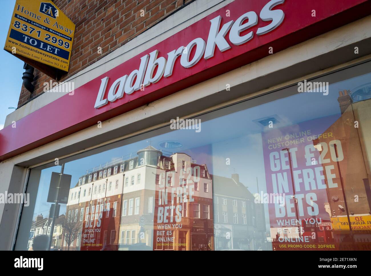 Exterior view of a betting shop on a high street with many closing down as the gambling business have rapidly move online Stock Photo