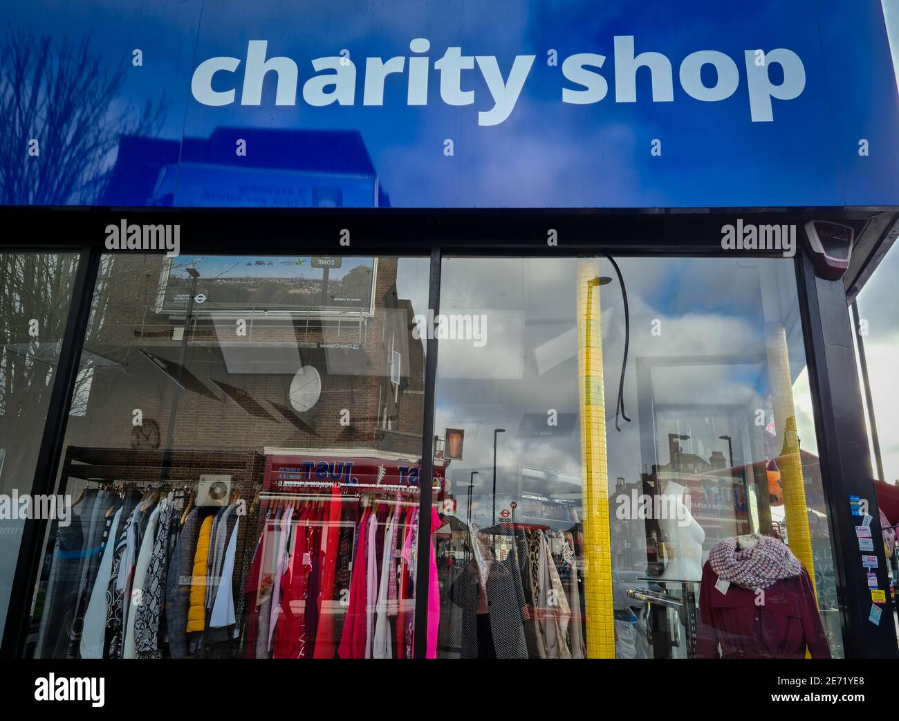 A charity shop selling donated goods to raise money for good causes. Stock Photo
